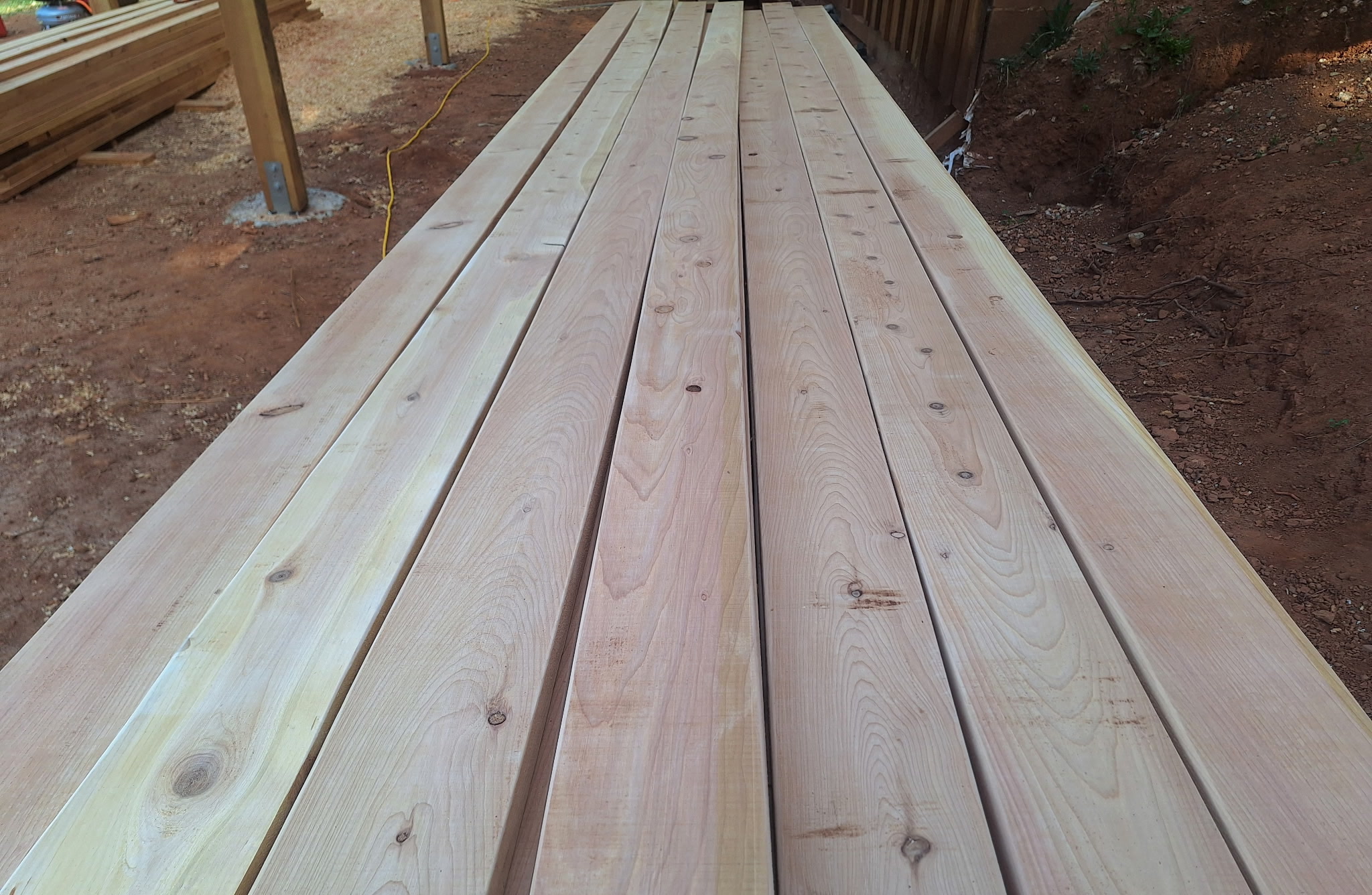 Long boards lined up after milling.