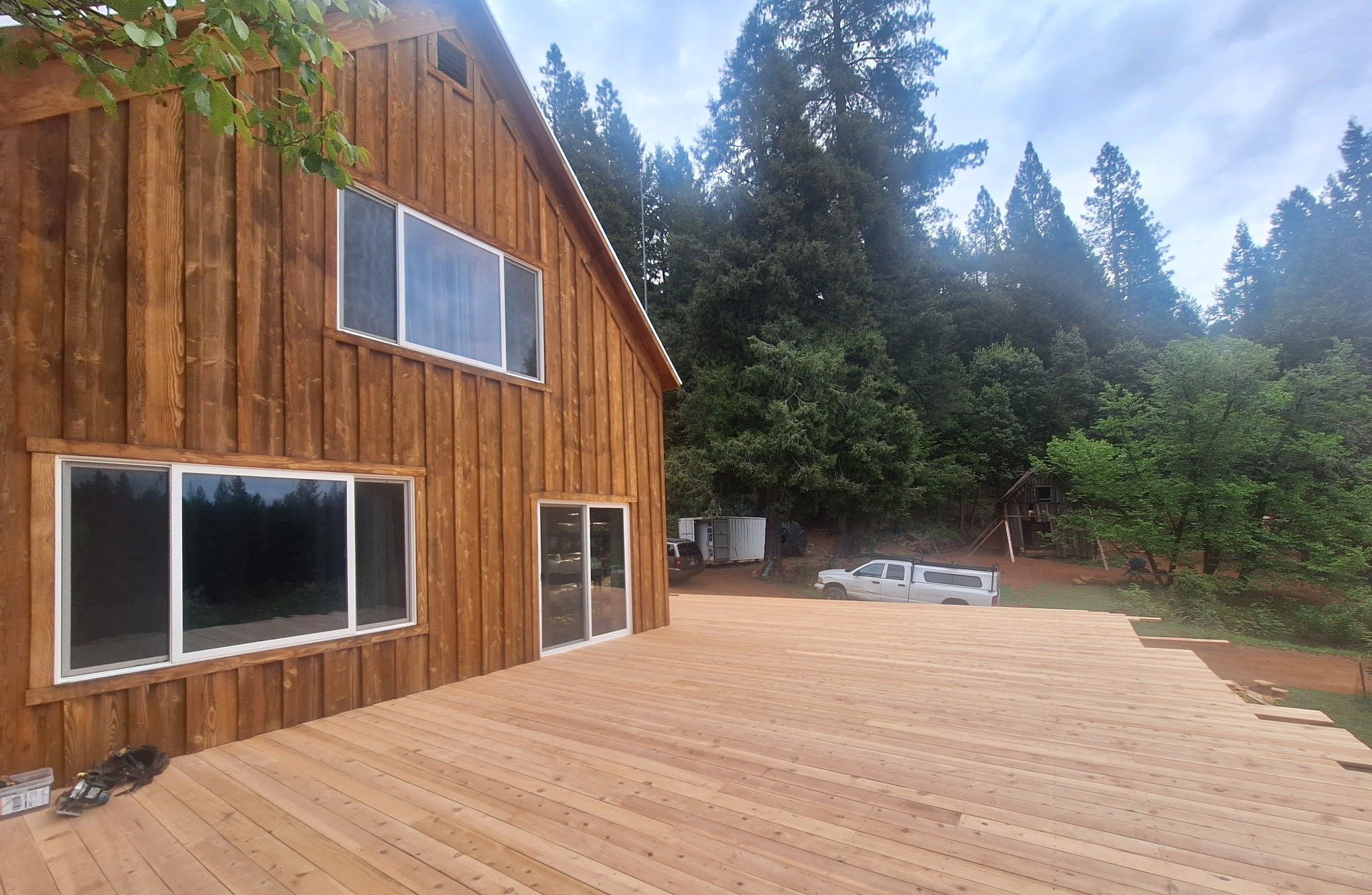 Deck and house exterior built with custom lumber.